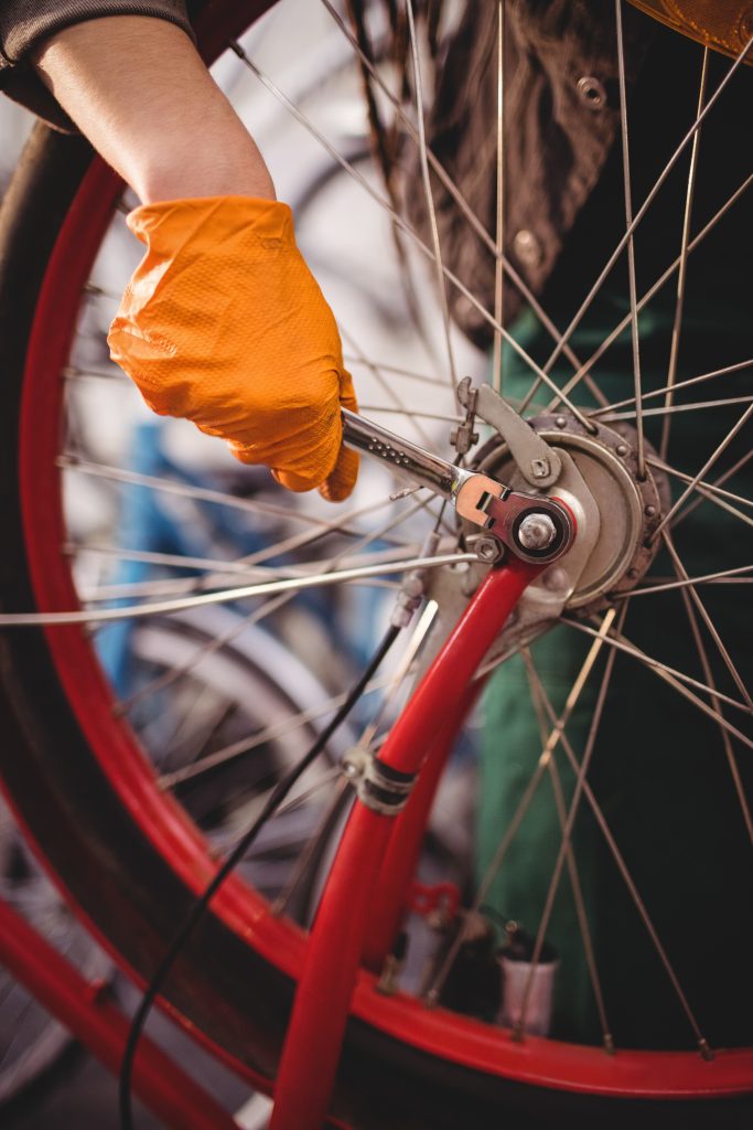 Professional mechanical adjustments and custom wheel servicing at the Bike Improve workshop.